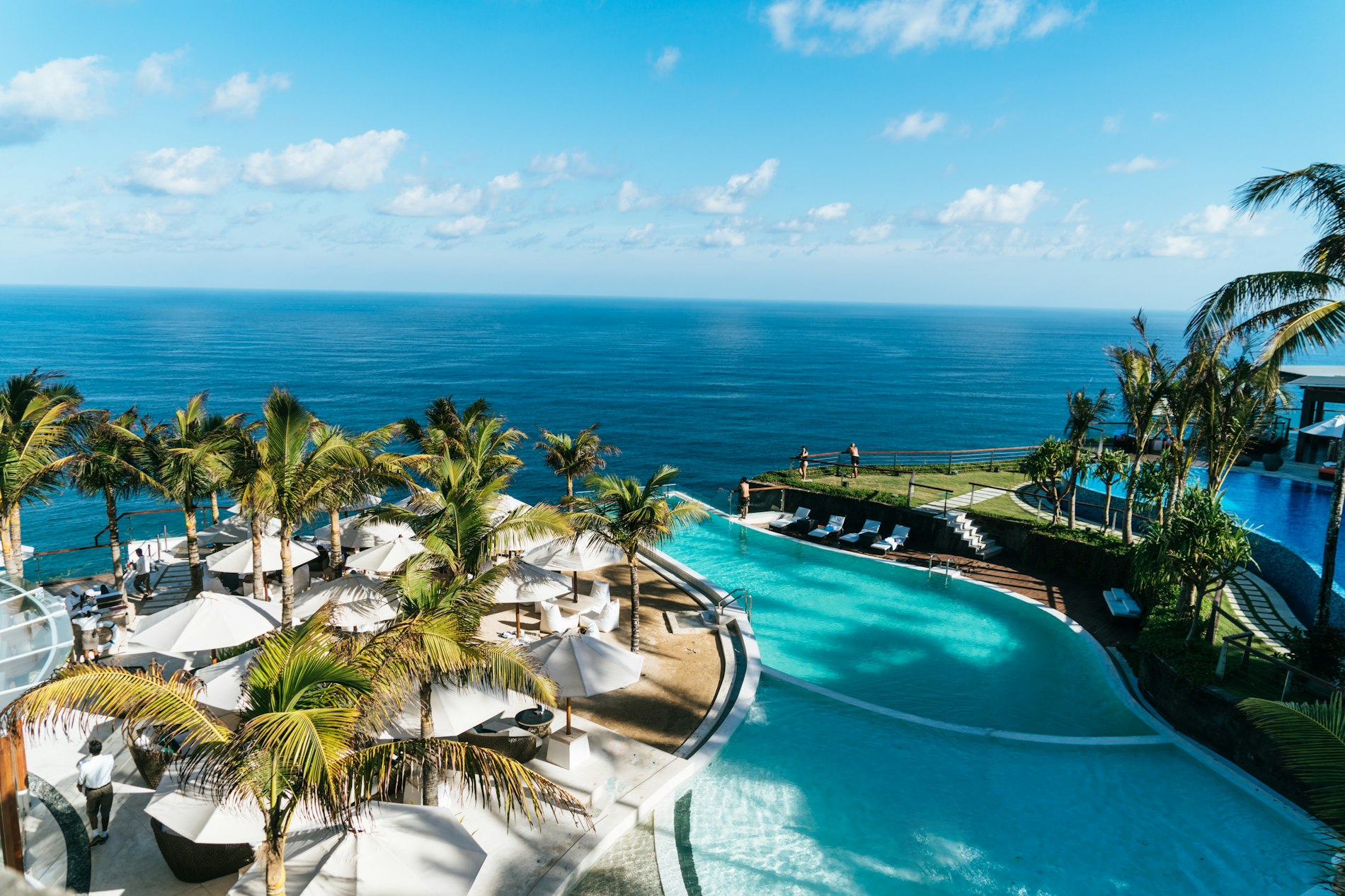 Infinity pool overlooking the Caribbean sea at sunset